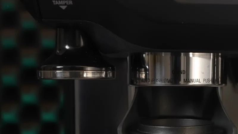 the barista touch tamper is magnetically attached to the machine