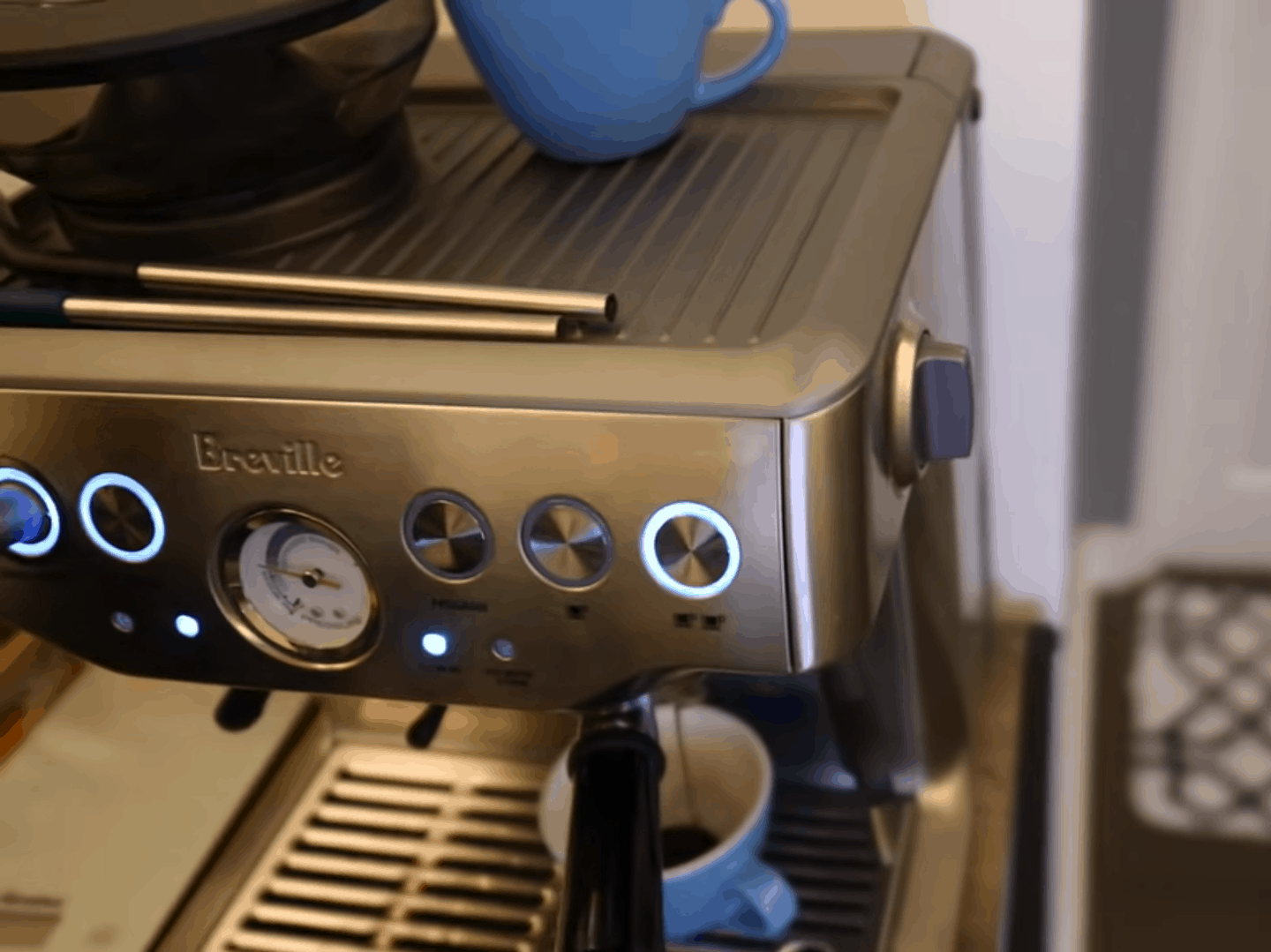 Breville Barista Express makes a cup of coffee