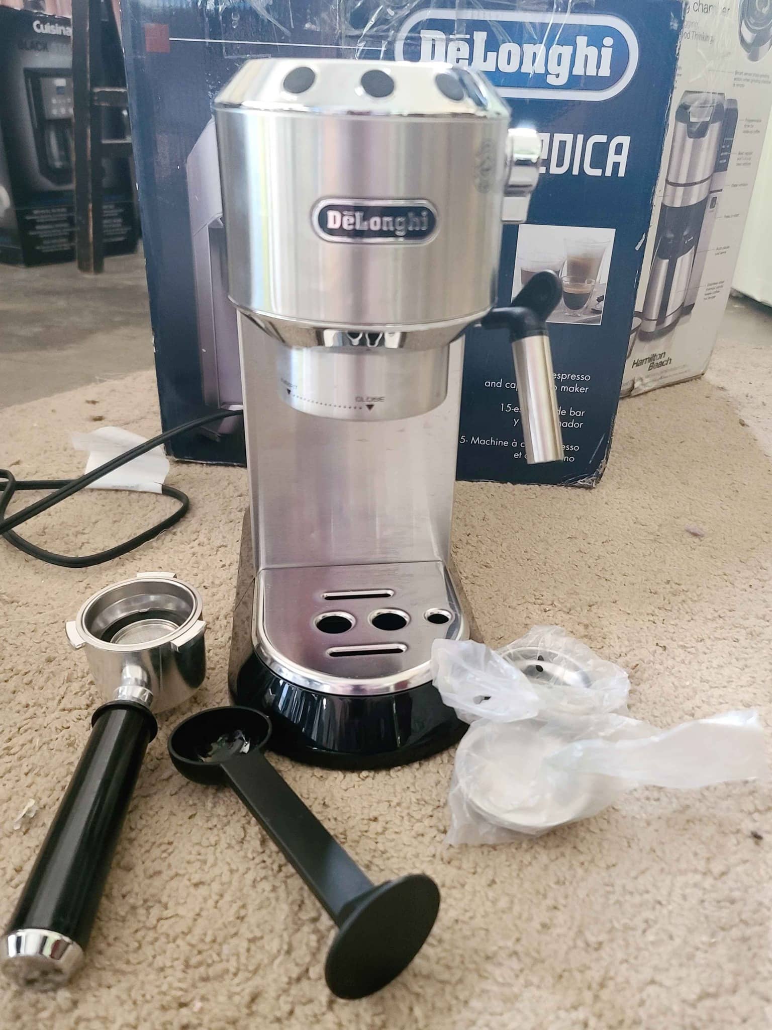 The Delonghi has some plastic parts