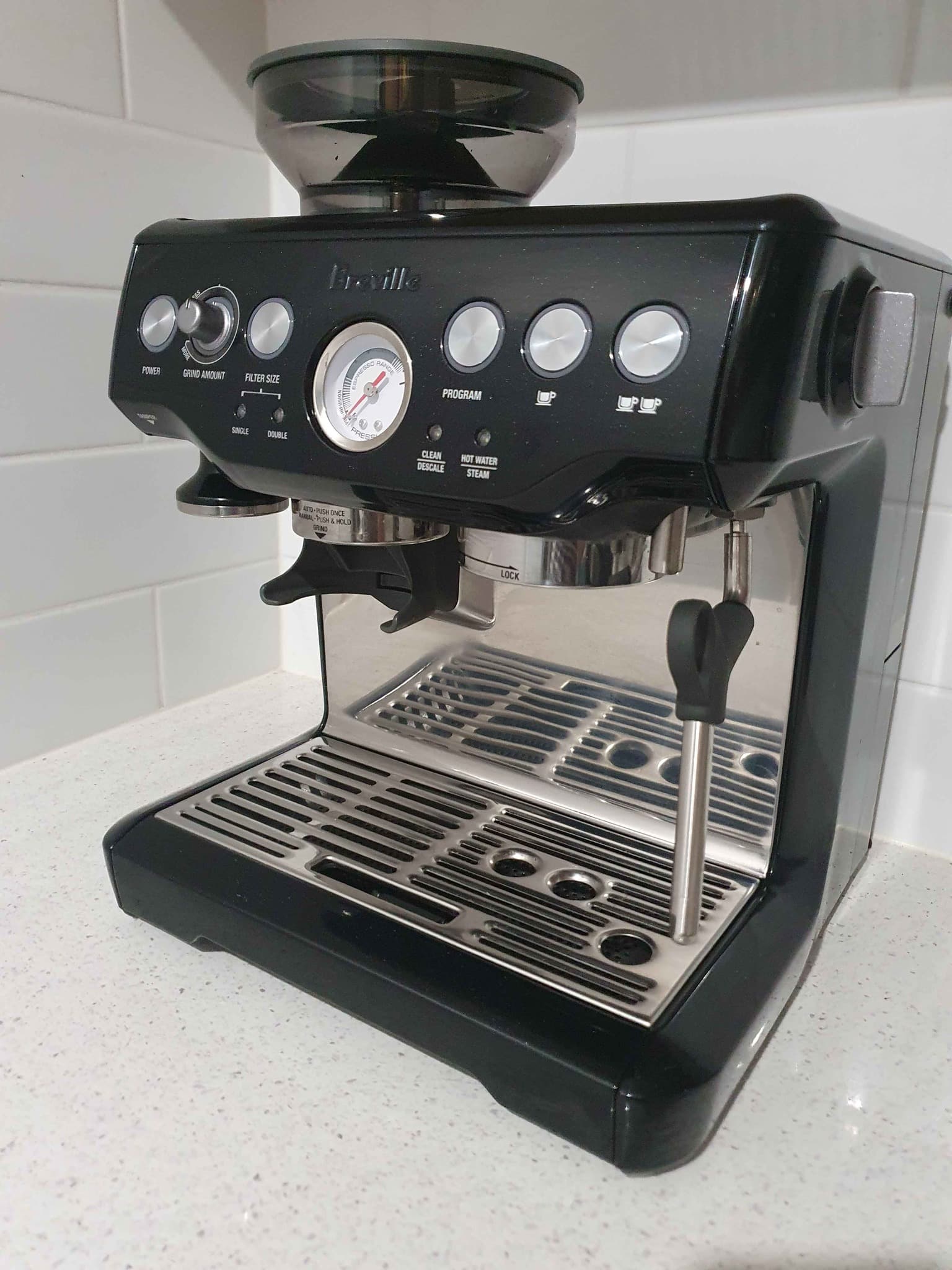 Breville Barista Express is equipped with a conical burr grinder