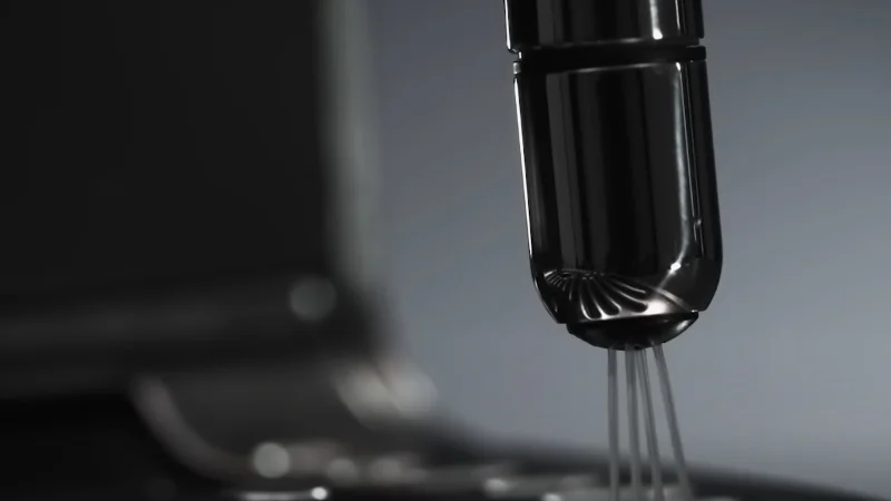 the wand automatically purges milk residue when placed in its original position